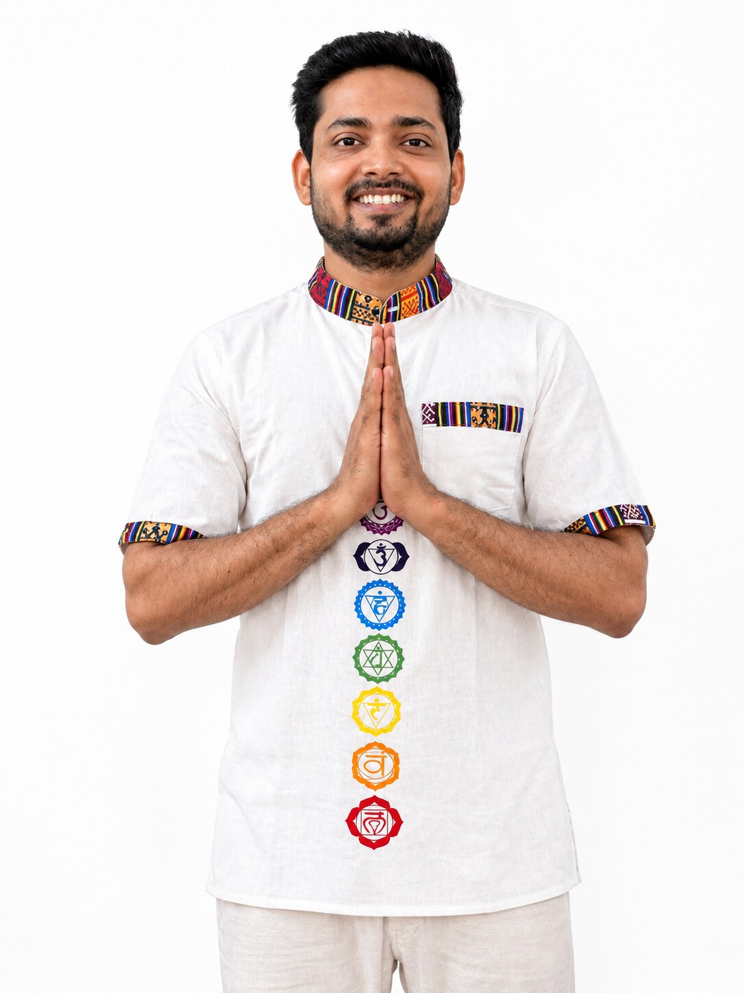 Manish, founder and lead instructor of Veda Yoga Studio, greeting with a namaste